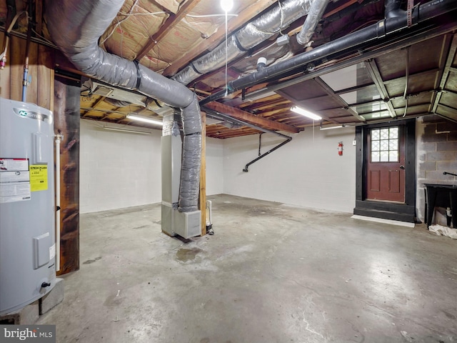 258 Merrimack, Falling Waters, WV 25419 - below grade area featuring electric water heater, concrete block wall, and heating unit
