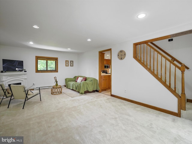 258 Merrimack, Falling Waters, WV 25419 - living room featuring recessed lighting, carpet flooring, stairway, and a fireplace