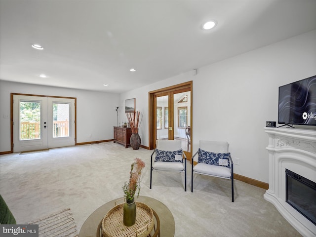 258 Merrimack, Falling Waters, WV 25419 - carpeted living room with french doors, recessed lighting, and a glass covered fireplace