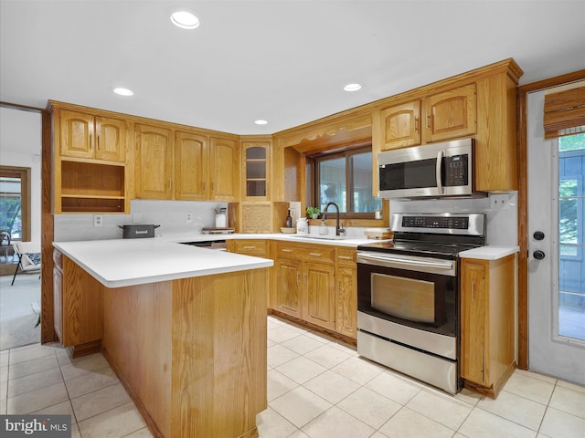 258 Merrimack, Falling Waters, WV 25419 - kitchen with appliances with stainless steel finishes, decorative backsplash, light countertops, recessed lighting, and light tile patterned floors