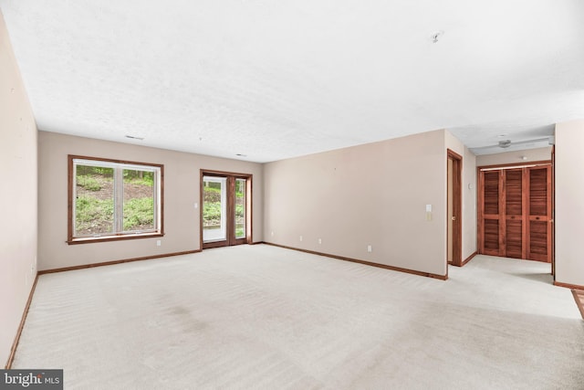 23140 Cobblestone Ln Unit 109, California, MD 20619 - spare room with light carpet and fire sprinkler in ceiling