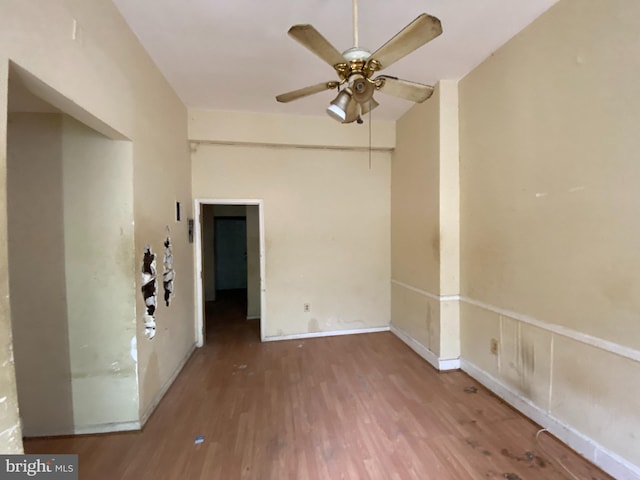 2110 N Charles St N, Baltimore, MD 21218 - empty room with wood finished floors and a ceiling fan