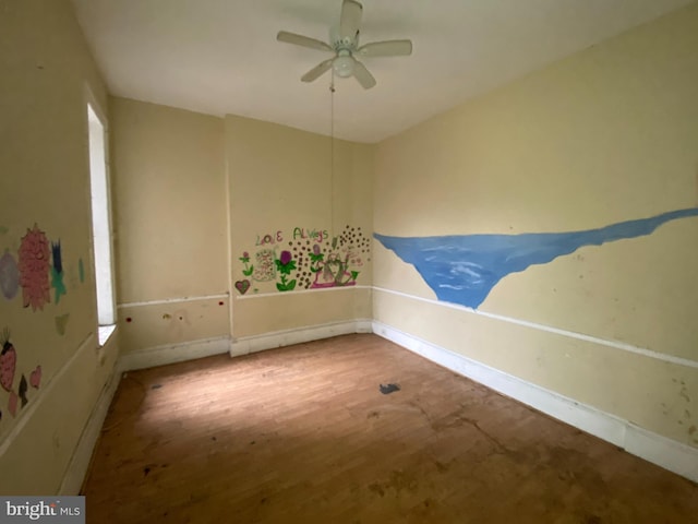 2110 N Charles St N, Baltimore, MD 21218 - unfurnished room with ceiling fan and wood finished floors