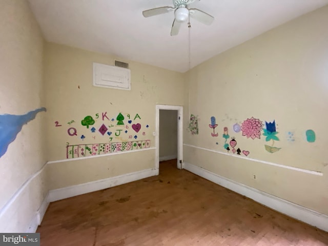 2110 N Charles St N, Baltimore, MD 21218 - empty room with ceiling fan and wood finished floors