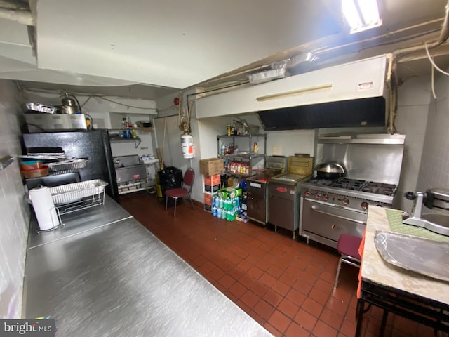 2110 N Charles St N, Baltimore, MD 21218 - kitchen featuring dark tile patterned flooring