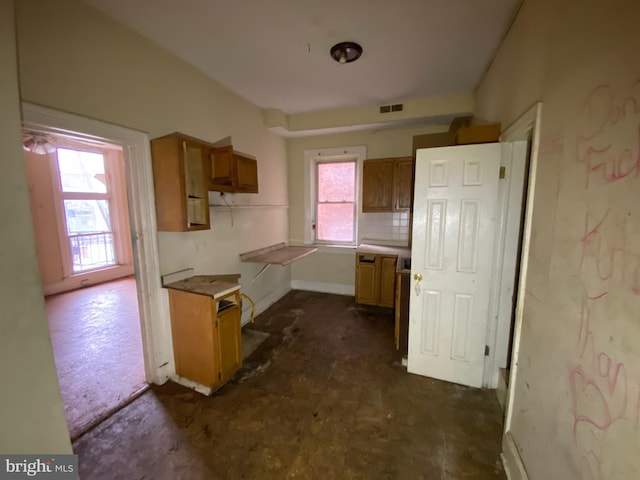 2110 N Charles St N, Baltimore, MD 21218 - kitchen featuring brown cabinetry