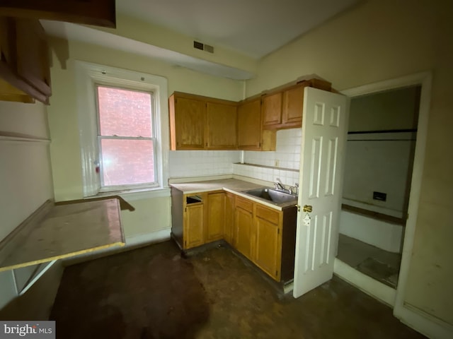 2110 N Charles St N, Baltimore, MD 21218 - kitchen with light countertops and decorative backsplash