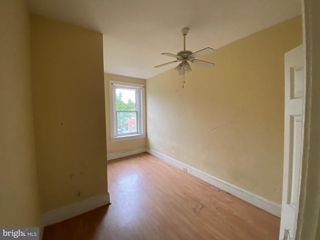 2110 N Charles St N, Baltimore, MD 21218 - unfurnished room with wood finished floors, ceiling fan, and vaulted ceiling