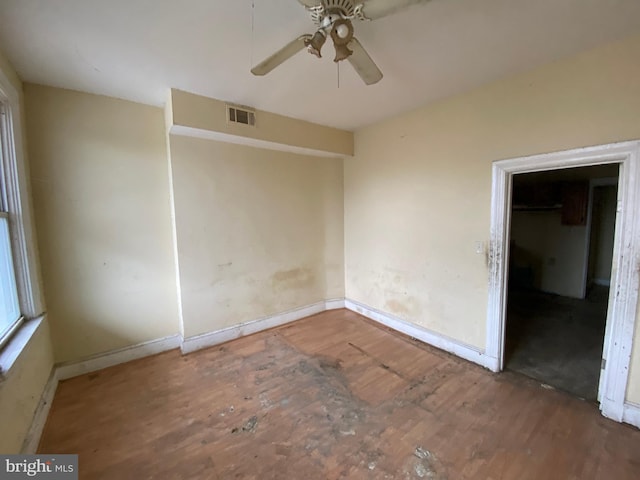 2110 N Charles St N, Baltimore, MD 21218 - spare room with a ceiling fan and wood finished floors