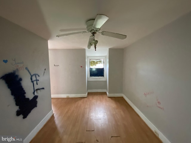 2110 N Charles St N, Baltimore, MD 21218 - empty room with light wood-type flooring and ceiling fan