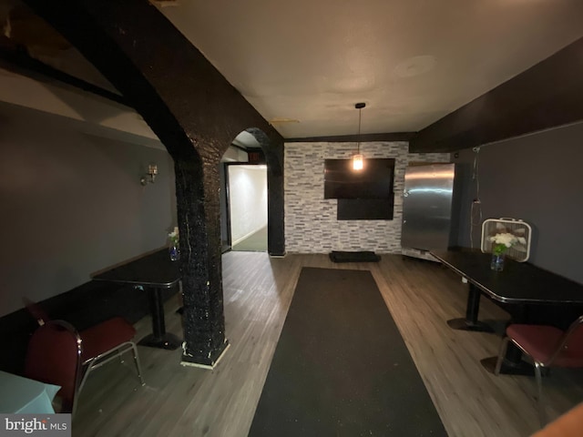 2110 N Charles St N, Baltimore, MD 21218 - living room with wood finished floors and arched walkways