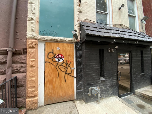 2110 N Charles St N, Baltimore, MD 21218 - entrance to property featuring brick siding