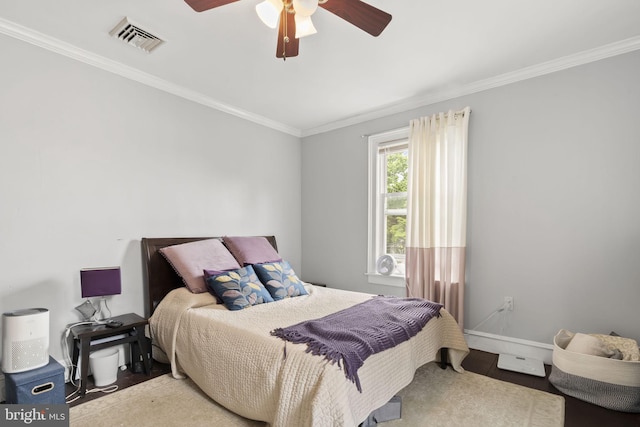 33 Waverly Rd, Wyncote, PA 19095 - bedroom with crown molding, wood finished floors, and ceiling fan