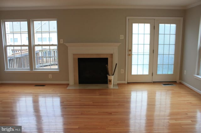 7018 Oak Grove Way Unit 88, Elkridge, MD 21075 - unfurnished living room featuring wood finished floors, ornamental molding, and a fireplace with flush hearth