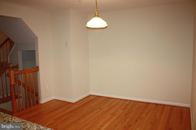 7018 Oak Grove Way Unit 88, Elkridge, MD 21075 - empty room featuring light wood-type flooring and stairs