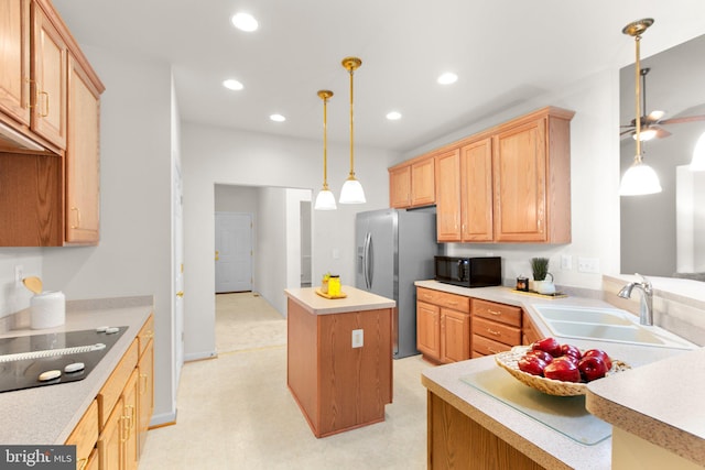 4049 Chatham Dr, King George, VA 22485 - kitchen featuring black appliances, ceiling fan, a center island, recessed lighting, and decorative light fixtures