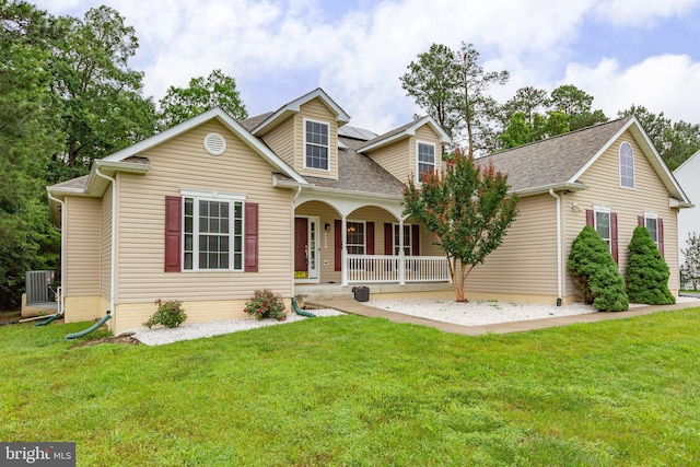 4049 Chatham Dr, King George, VA 22485 - view of front of home with a porch, a front lawn, and roof with shingles
