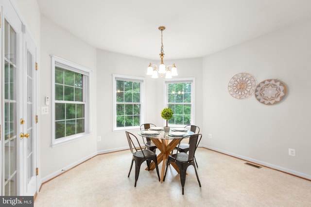 4049 Chatham Dr, King George, VA 22485 - dining room with a chandelier and baseboards