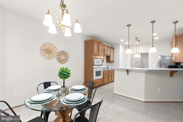 4049 Chatham Dr, King George, VA 22485 - dining room featuring a chandelier and recessed lighting