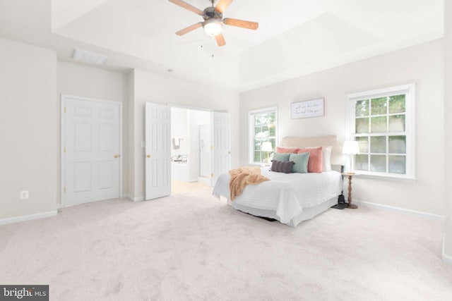 4049 Chatham Dr, King George, VA 22485 - carpeted bedroom with a raised ceiling and a ceiling fan