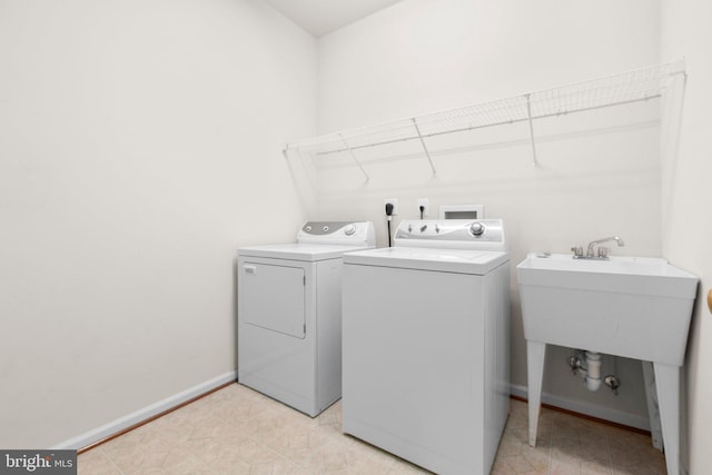 4049 Chatham Dr, King George, VA 22485 - washroom with washer and dryer and baseboards