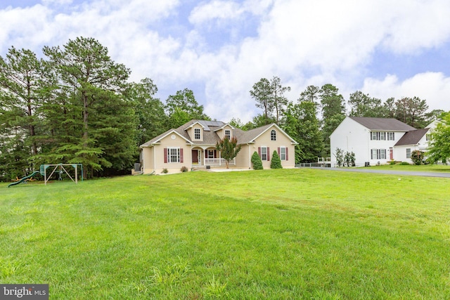 4049 Chatham Dr, King George, VA 22485 - view of front of property with a front lawn and a playground