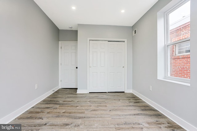 3321 N 11th St, Philadelphia, PA 19140 - unfurnished bedroom featuring a closet, wood finished floors, and recessed lighting