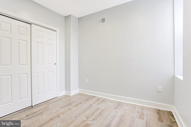3321 N 11th St, Philadelphia, PA 19140 - unfurnished bedroom with light wood finished floors and a closet