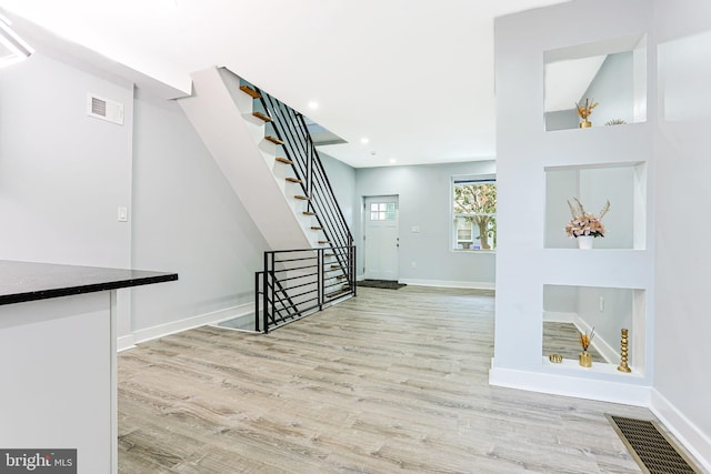 3321 N 11th St, Philadelphia, PA 19140 - stairway featuring wood finished floors and recessed lighting