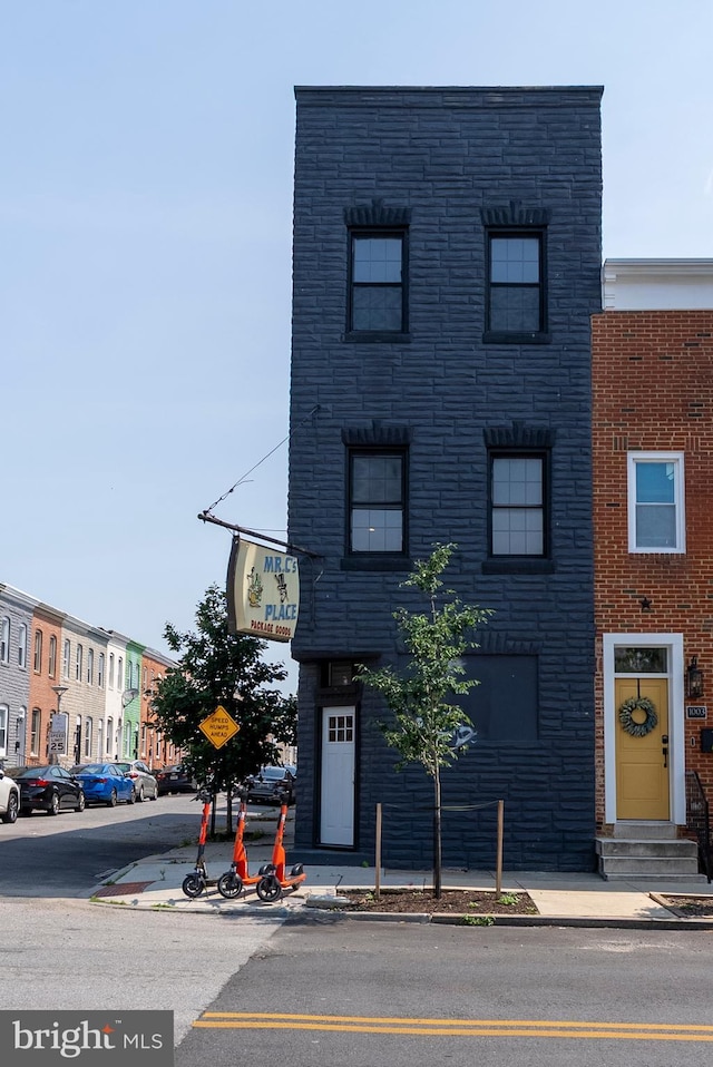 1001 S Carey St, Baltimore, MD 21223 - view of front of house with stone siding