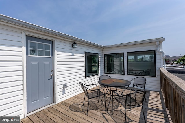 1001 S Carey St, Baltimore, MD 21223 - wooden deck with outdoor dining space