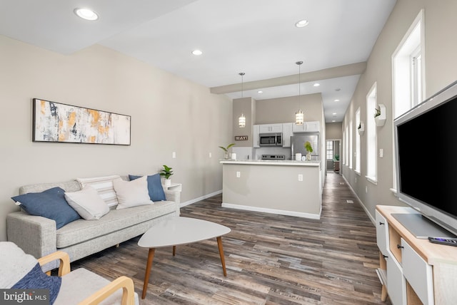 1001 S Carey St, Baltimore, MD 21223 - living area featuring dark wood finished floors and recessed lighting