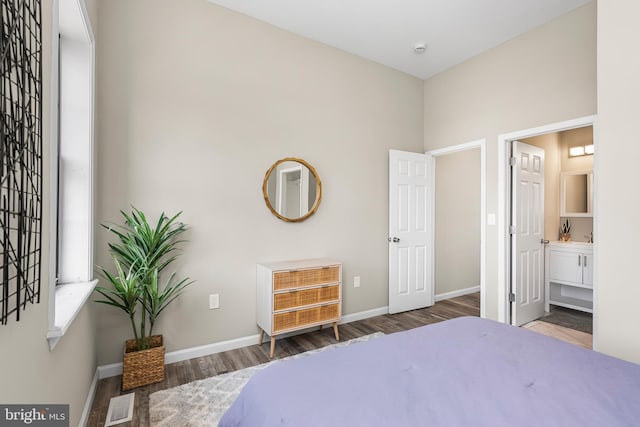 1001 S Carey St, Baltimore, MD 21223 - bedroom with wood finished floors and ensuite bath