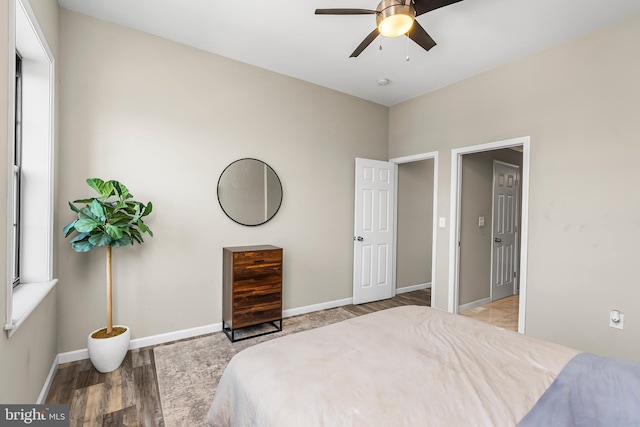 1001 S Carey St, Baltimore, MD 21223 - bedroom featuring light wood-style floors and ceiling fan