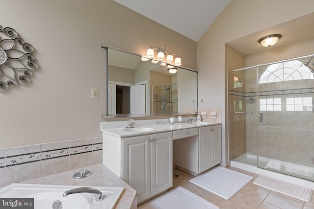 13 Buckwalter Cir, Royersford, PA 19468 - full bathroom with vaulted ceiling, a stall shower, double vanity, a bath, and tile patterned flooring
