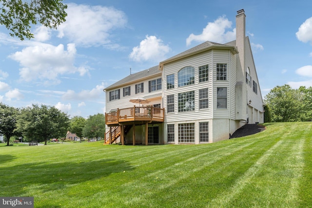 13 Buckwalter Cir, Royersford, PA 19468 - back of property with a wooden deck, stairway, a chimney, and a yard