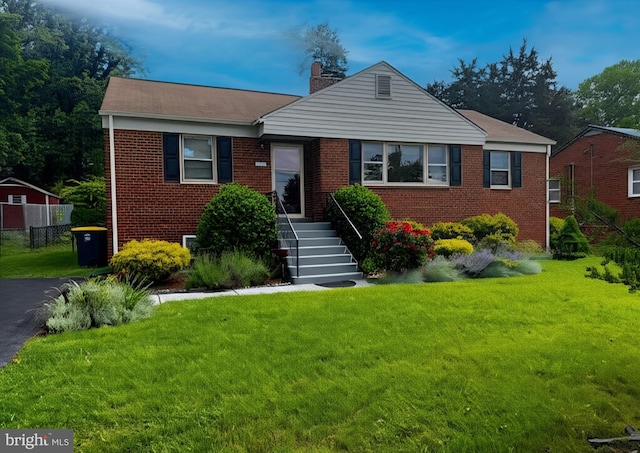4502 Hargrove Rd, Temple Hills, MD 20748 - view of front of home with brick siding, a front yard, and a chimney