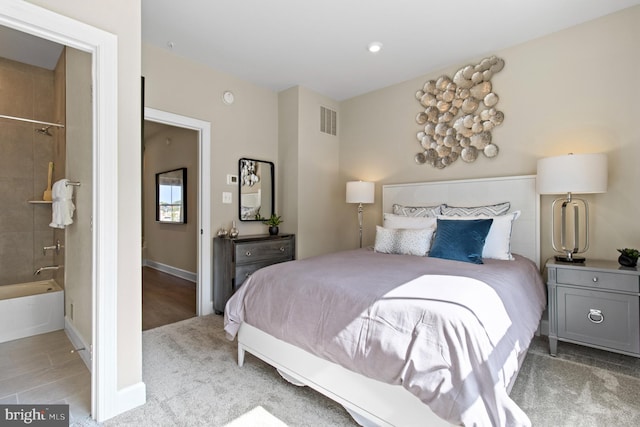 6049 Beake St, Hyattsville, MD 20782 - bedroom with carpet floors and ensuite bath