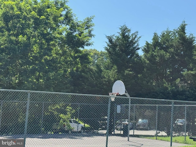 8902 Chesapeake Lighthouse Dr, North Beach, MD 20714 - view of tennis court featuring community basketball court