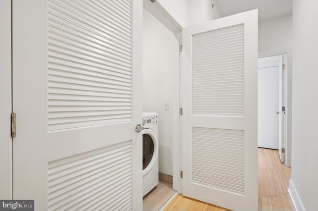 914 N Front St, Philadelphia, PA 19123 - washroom featuring washer / clothes dryer and light wood-style floors