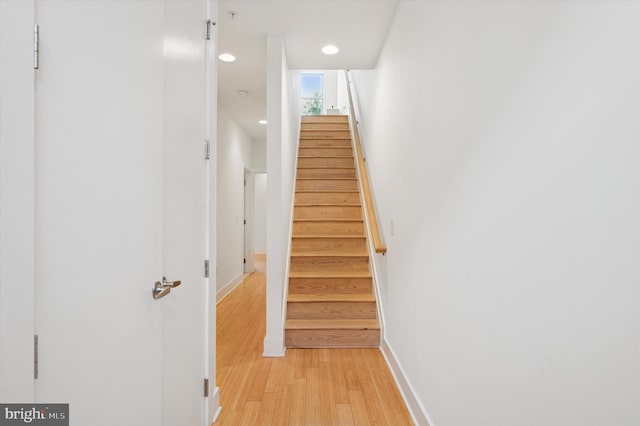 914 N Front St, Philadelphia, PA 19123 - staircase featuring wood finished floors and recessed lighting