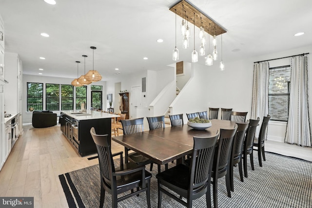 3536 Sutton Heights Cir, Fairfax, VA 22031 - dining area with recessed lighting, light wood-style flooring, and stairs