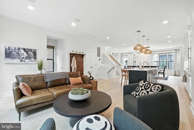3536 Sutton Heights Cir, Fairfax, VA 22031 - living area featuring light wood-style flooring, recessed lighting, and stairs