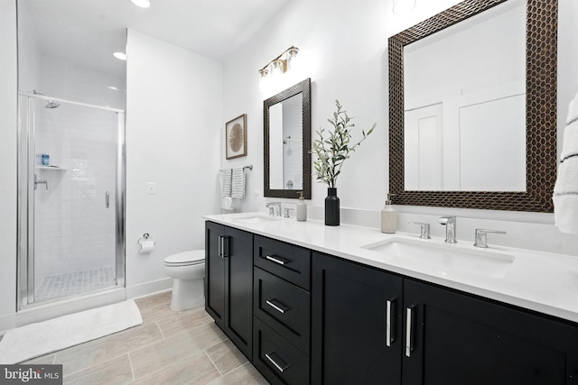 3536 Sutton Heights Cir, Fairfax, VA 22031 - bathroom with double vanity, a stall shower, and recessed lighting