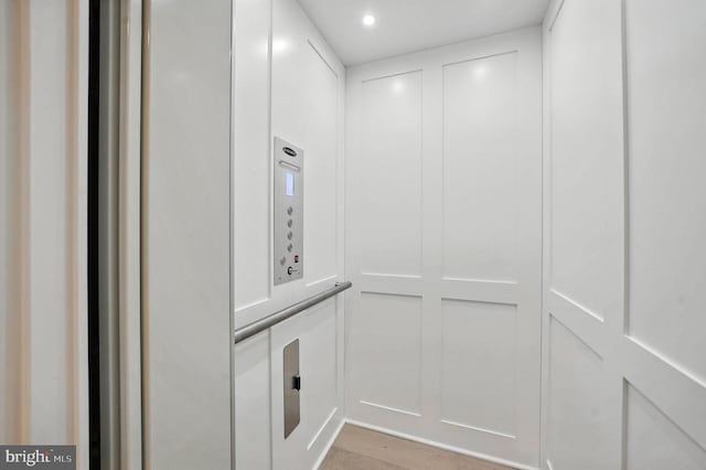 3536 Sutton Heights Cir, Fairfax, VA 22031 - elevator featuring wood finished floors and recessed lighting