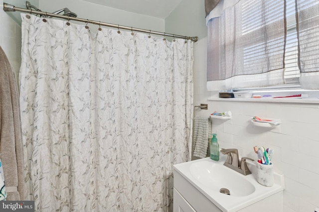 1128 Wilson Dr, Havertown, PA 19083 - full bathroom with vanity, tile walls, and curtained shower