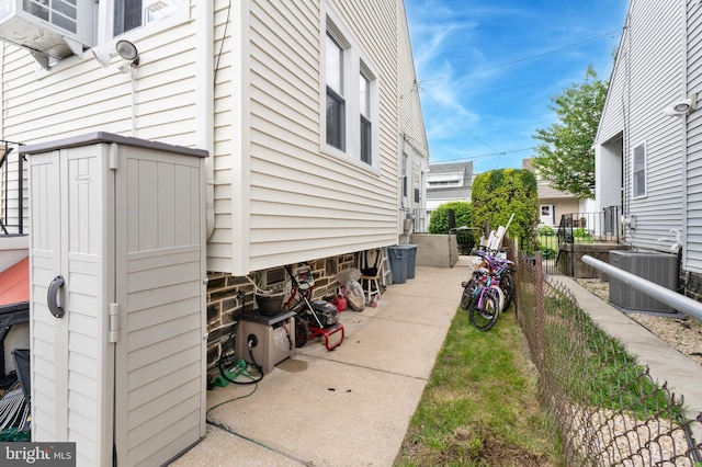 1128 Wilson Dr, Havertown, PA 19083 - view of side of home with a central air condition unit