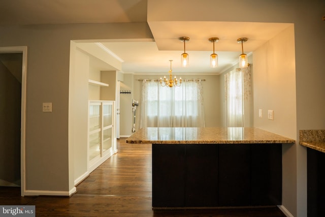 10 Kilkea Ct, Nottingham, MD 21236 - kitchen with a peninsula, a chandelier, dark wood finished floors, light stone countertops, and pendant lighting