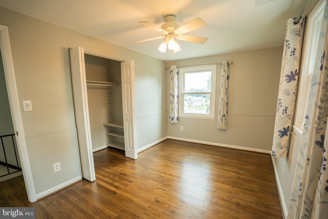 10 Kilkea Ct, Nottingham, MD 21236 - unfurnished bedroom with wood finished floors, a closet, a ceiling fan, and wainscoting
