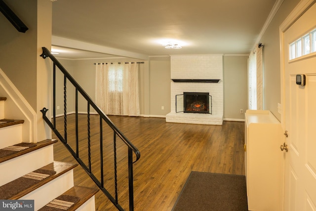 10 Kilkea Ct, Nottingham, MD 21236 - unfurnished living room with crown molding, wood finished floors, a fireplace, and stairway